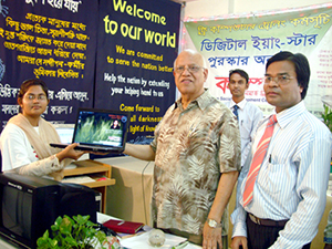 Finance Minister AMA Muhith handed over Computers to the Awardee of Digital Young Star Award as Chief Guest; Dr. M Helal is presiding over. (2010)